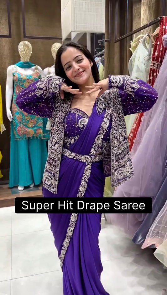 .INDO-WESTERN DRAPE SAREE…. 🚀 🥻WE ARE LAUNCHING NEW SUPERHIT TRENDING READY TO WEAR SAREE WITH FULLY EMBROIDERED KOTI ON RANGOLI SILK FABRIC WITH STITCH BLOUSE WHOLESALE GEELAN FASHION SURAT