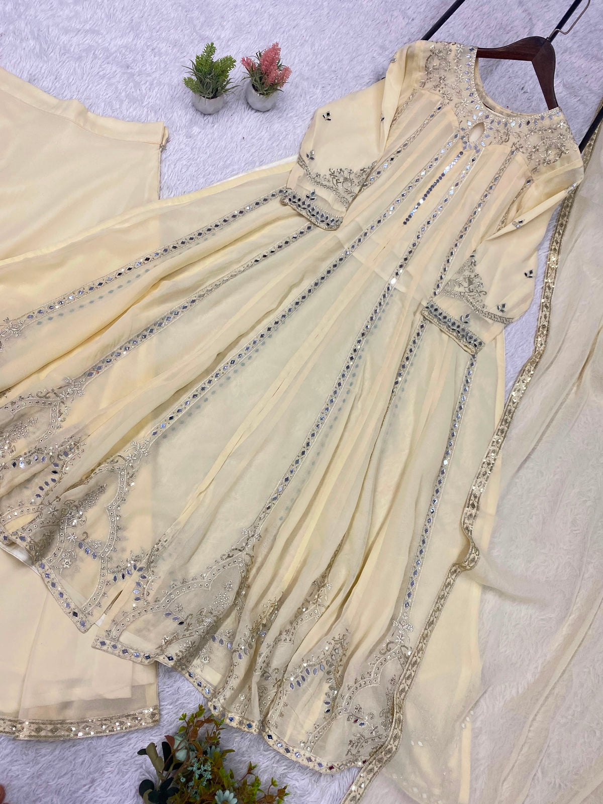 THIS FESTIVAL SEASON WEAR OUR BEAUTIFUL GOWN ,LAHENGA AND DUPATTA WITH SEQUENCE EMBROIDERY AND REAL MIRROR WORK WHOLESALE GEELAN FASHION SURAT