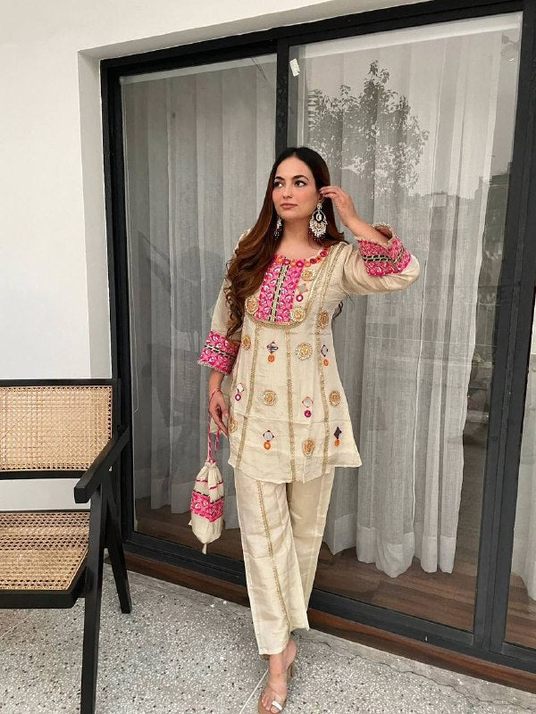EXCLUSIVE AND TRENDY CO-ORD SET FOR WEDDING SEASON WITH MIRROR AND SEQUENCE EMBROIDERED TOP AND PLAZZO WHOLESALE GEELAN FASHION SURAT