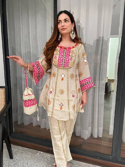 EXCLUSIVE AND TRENDY CO-ORD SET FOR WEDDING SEASON WITH MIRROR AND SEQUENCE EMBROIDERED TOP AND PLAZZO WHOLESALE GEELAN FASHION SURAT