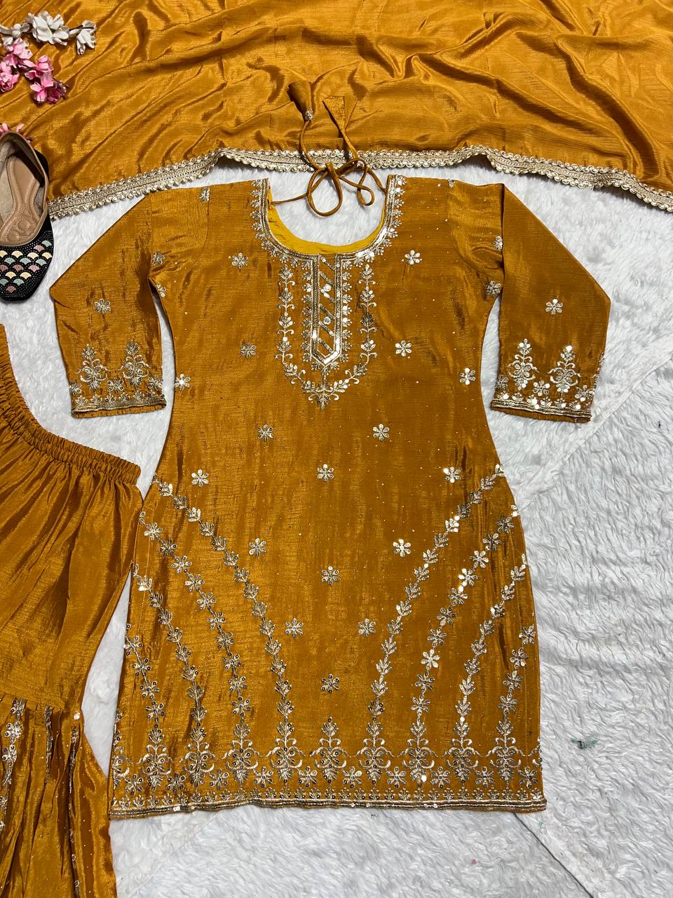 PURE HEAVY CHINNON SILK WITH HEAVY EMBROIDERY WORK WITH FANCY BORDERS LESS WORK SLEEVE WITH FANCY LATKAN DORI. WHOLESALE GEELAN FASHION SURAT
