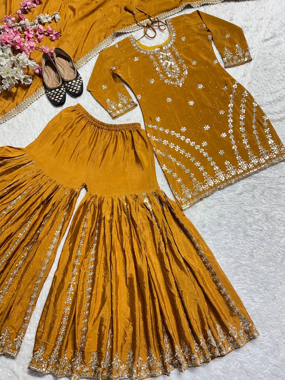 PURE HEAVY CHINNON SILK WITH HEAVY EMBROIDERY WORK WITH FANCY BORDERS LESS WORK SLEEVE WITH FANCY LATKAN DORI. WHOLESALE GEELAN FASHION SURAT