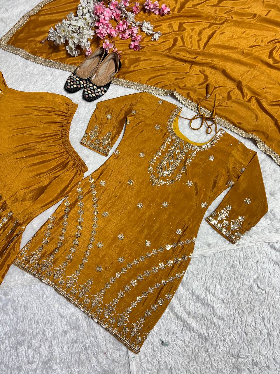 PURE HEAVY CHINNON SILK WITH HEAVY EMBROIDERY WORK WITH FANCY BORDERS LESS WORK SLEEVE WITH FANCY LATKAN DORI. WHOLESALE GEELAN FASHION SURAT