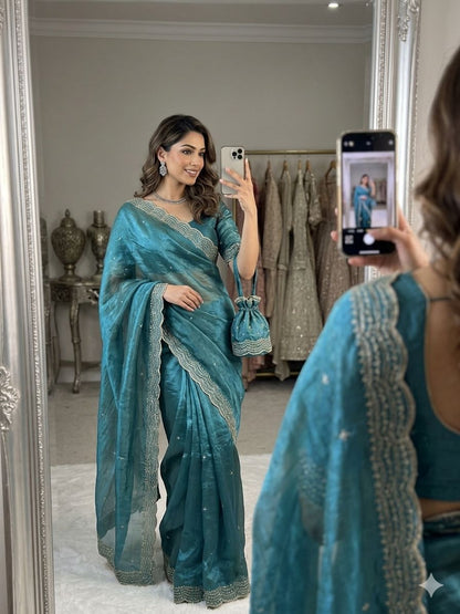 PREMIUM TWO TONE SPACE SILK SAREE WITH BEAUTIFUL MULTI SEQUENCE & CUTDENA WORK IN ALL OVER SAREE  PAIRED WITH A MATCHING EMBROIDERY BLOUSE FEATURING RICH EMBROIDERY WORK WHOLESALE GEELAN FASHION SURAT