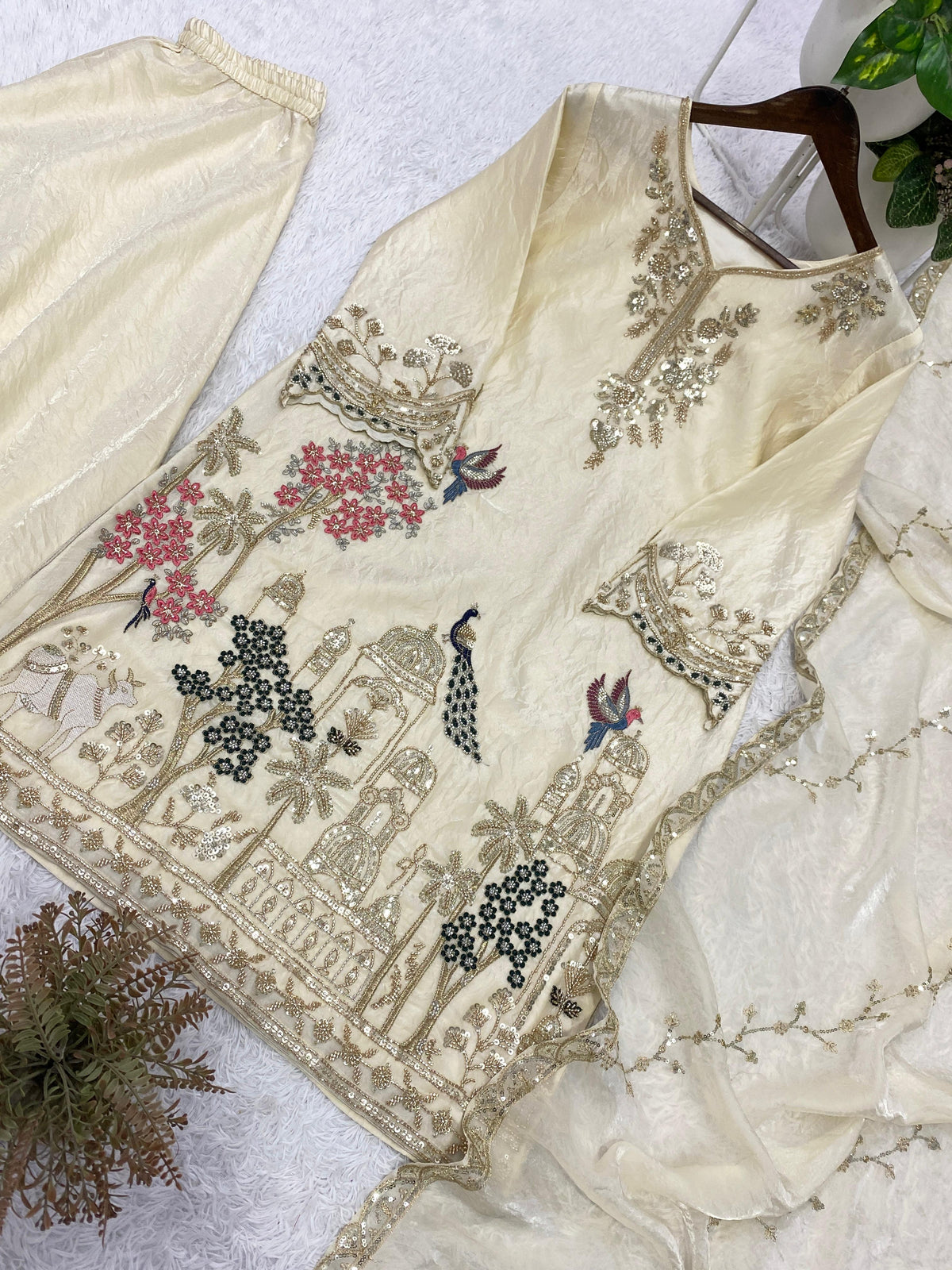 THIS WEDDING SEASON, TRY OUR DESIGNER BEADS WITH SEQUENCE EMBROIDERY WORKED TOP  PLAZZO SUIT WITH DUPATTA WHOLESALE GEELAN FASHION SURAT