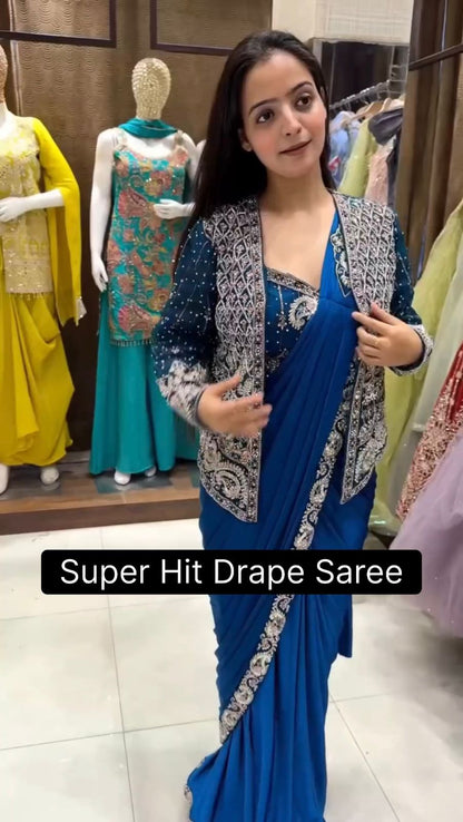 .INDO-WESTERN DRAPE SAREE…. 🚀 🥻WE ARE LAUNCHING NEW SUPERHIT TRENDING READY TO WEAR SAREE WITH FULLY EMBROIDERED KOTI ON  RANGOLI SILK FABRIC WITH STITCH BLOUSE WHOLESALE GEELAN FASHION SURAT