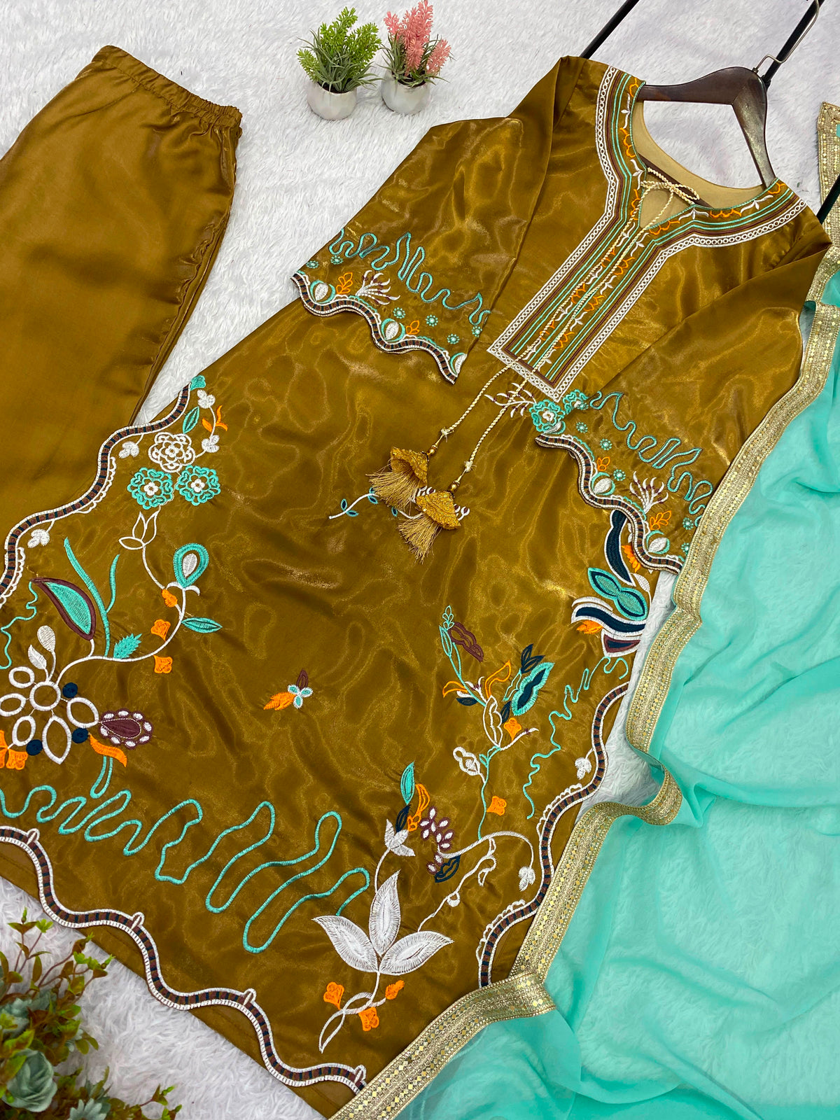 THIS WEDDING SEASON WEAR OUR BEAUTIFUL EMBROIDERED TOP, PANT WITH DUPATTA WHOLESALE GEELAN FASHION SURAT