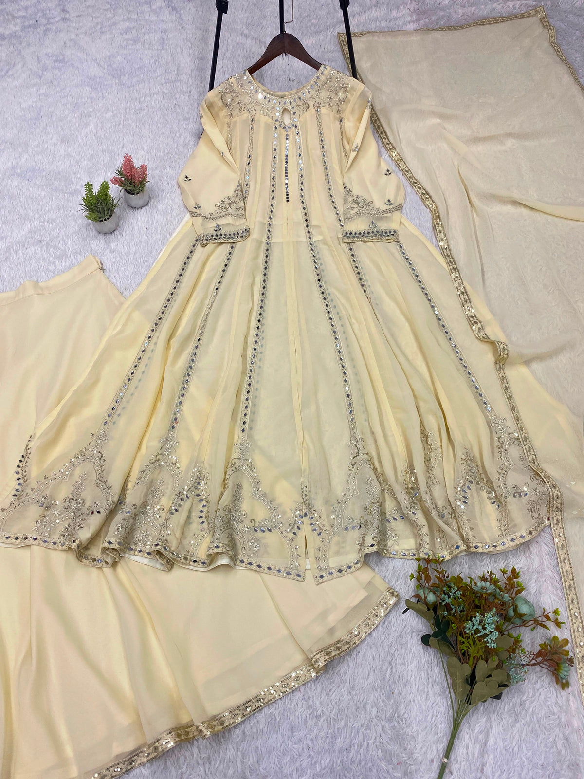 THIS FESTIVAL SEASON WEAR OUR BEAUTIFUL GOWN ,LAHENGA AND DUPATTA WITH SEQUENCE EMBROIDERY AND REAL MIRROR WORK WHOLESALE GEELAN FASHION SURAT