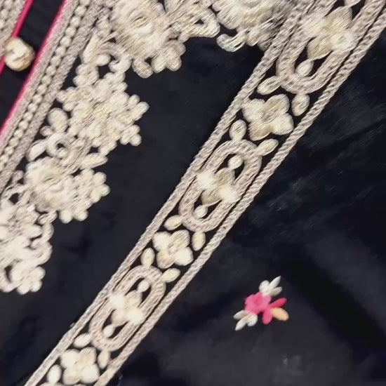 Premium black party wear Pakistani suit with embroidered palazzo and designer dupatta.