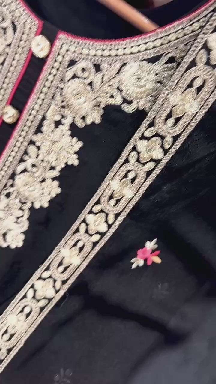 Premium black party wear Pakistani suit with embroidered palazzo and designer dupatta.