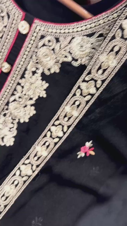 Premium black party wear Pakistani suit with embroidered palazzo and designer dupatta.